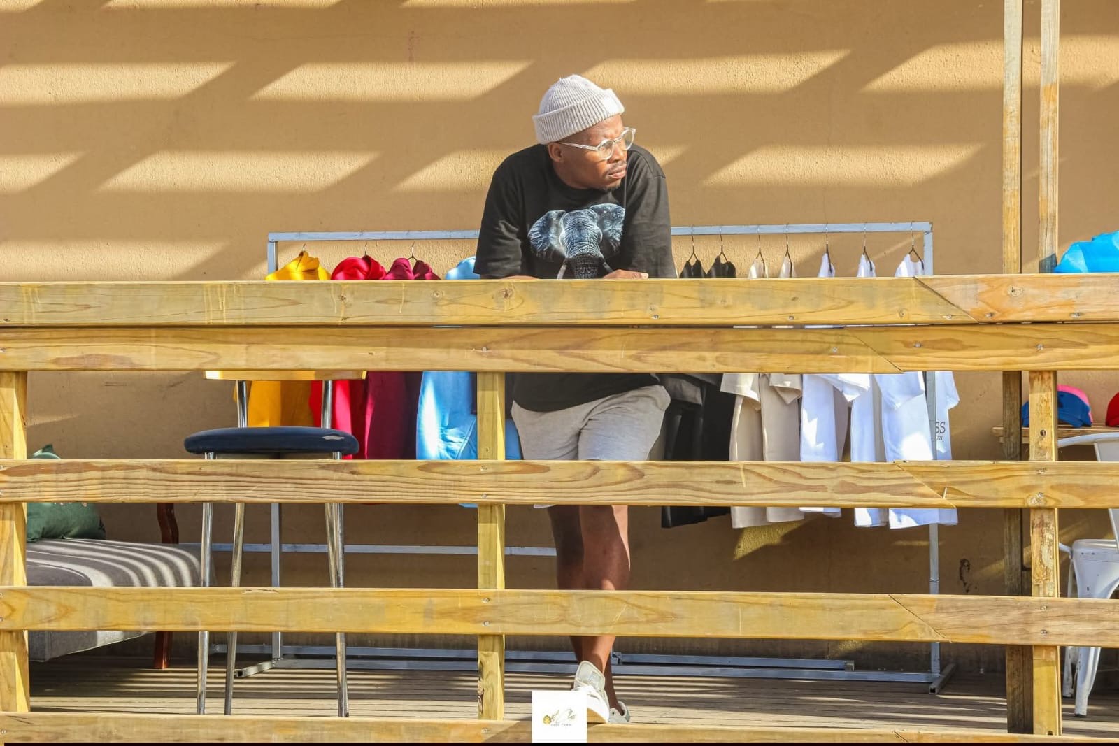 Sacxess founder at the market table